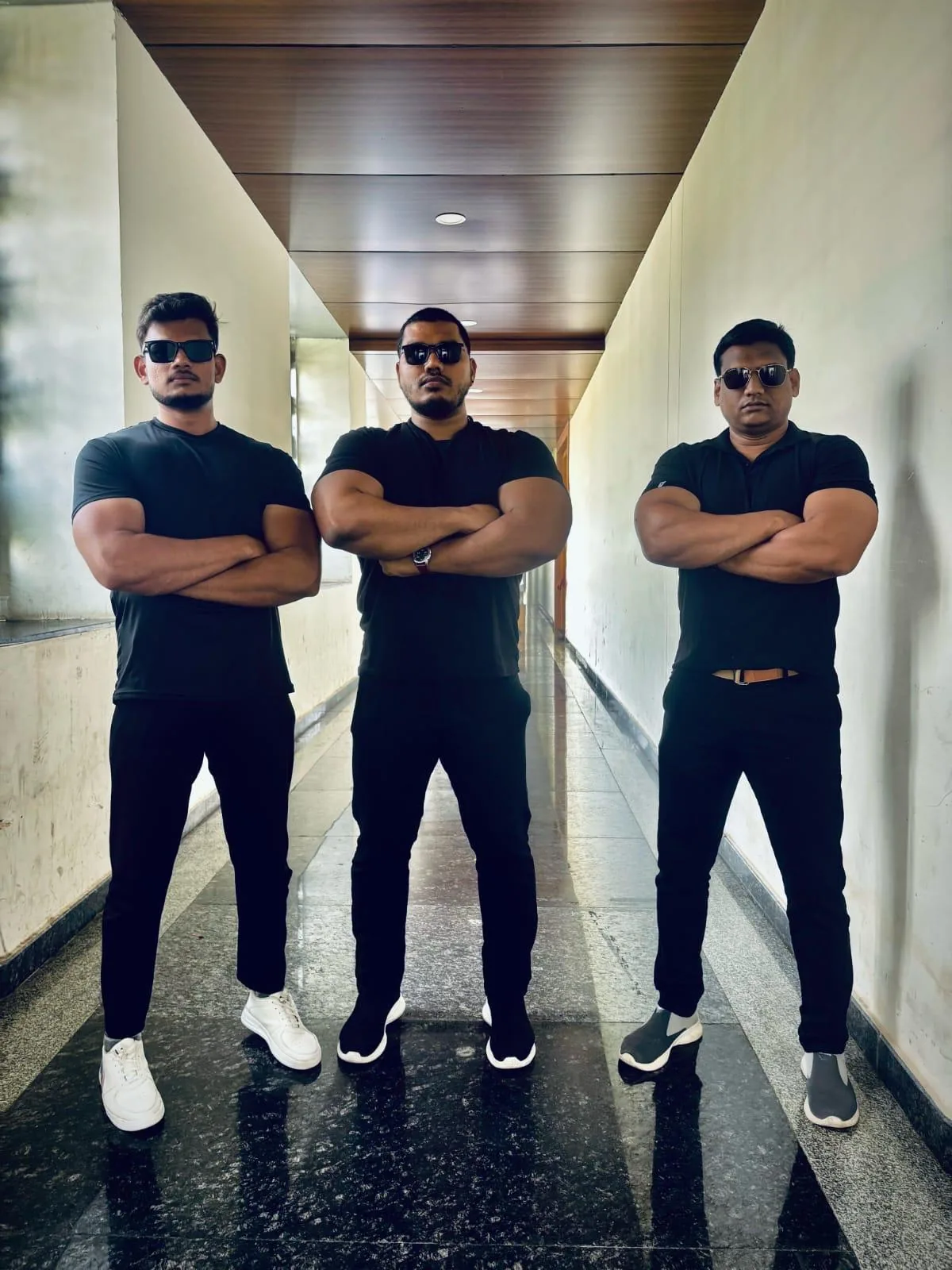 Three security personnel at a Hyderabad venue entrance