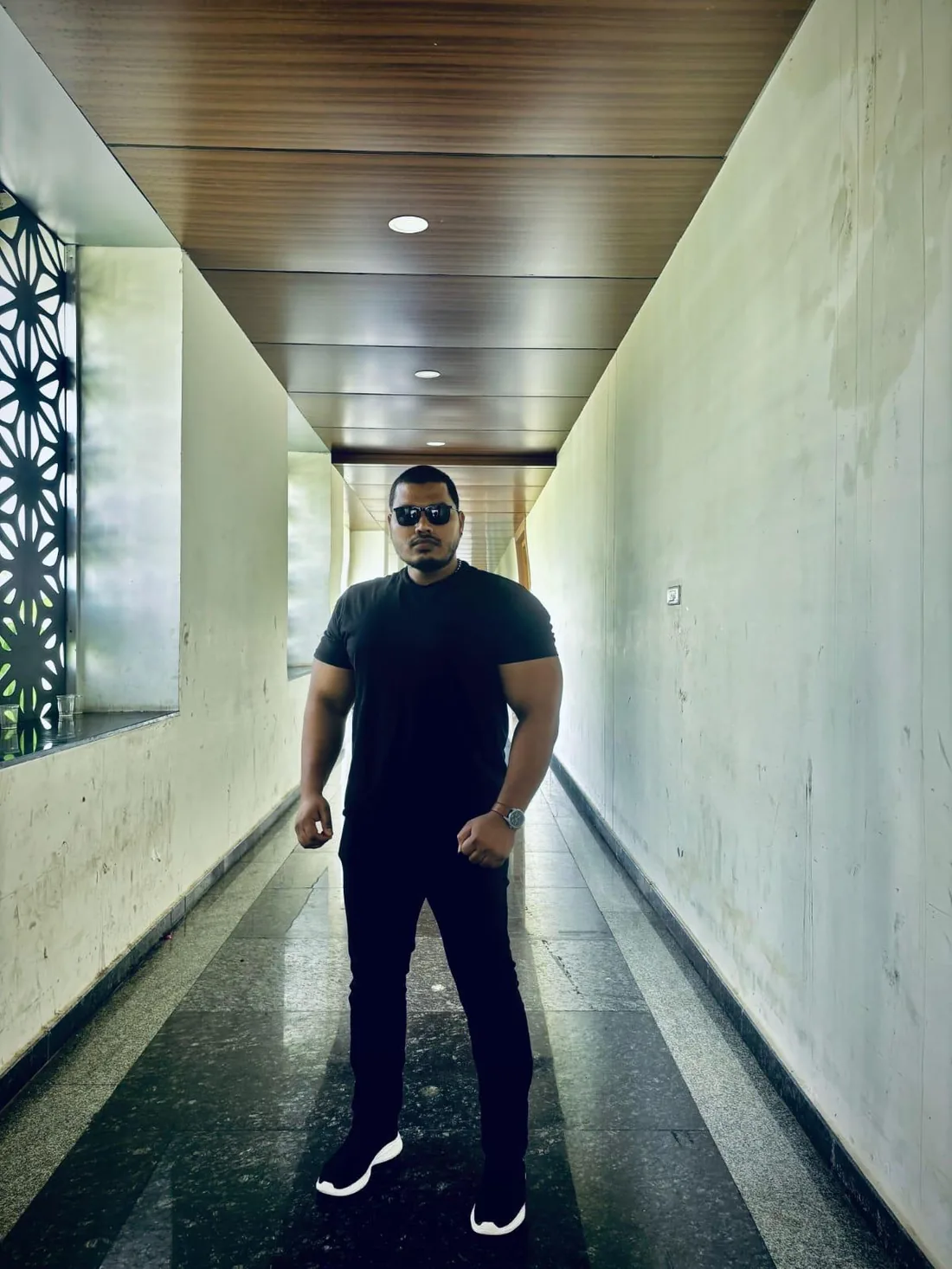 Security officer standing in a corridor