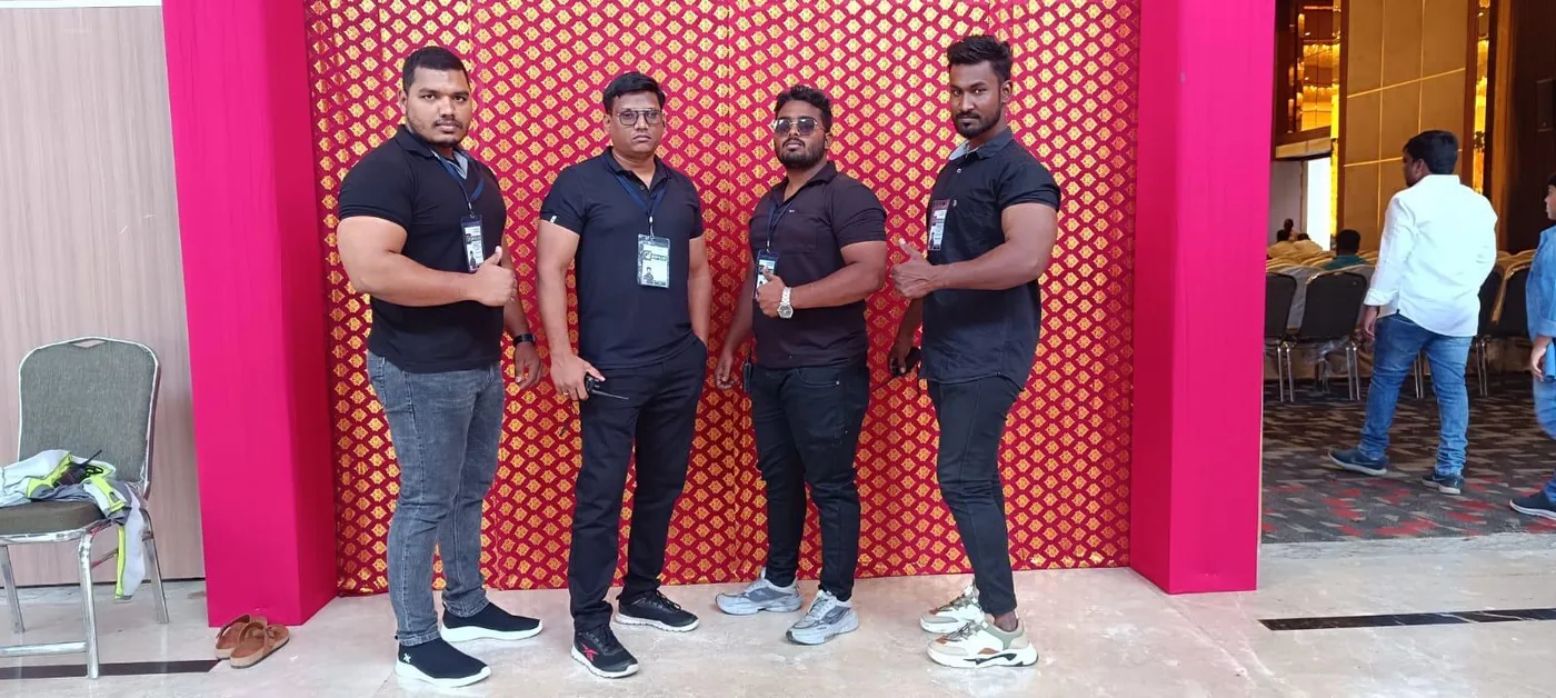 Security team at a private event with decor backdrop